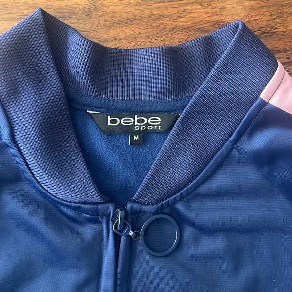 BEBE blue jacket with pink/white tripe on sleeves.Size M.Elegant, unique, Comfy. - Picture 2 of 6